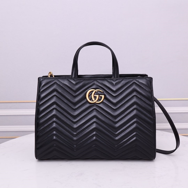 G*u*i shopping bags